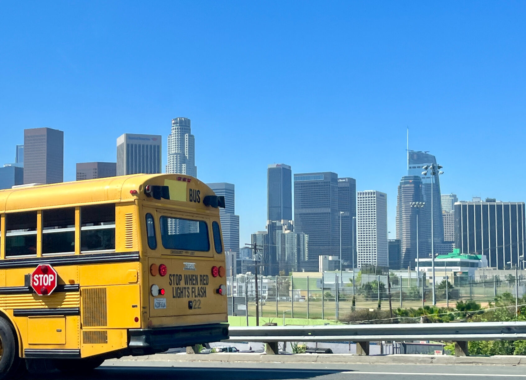 Los Angeles financial district and yellow school bus